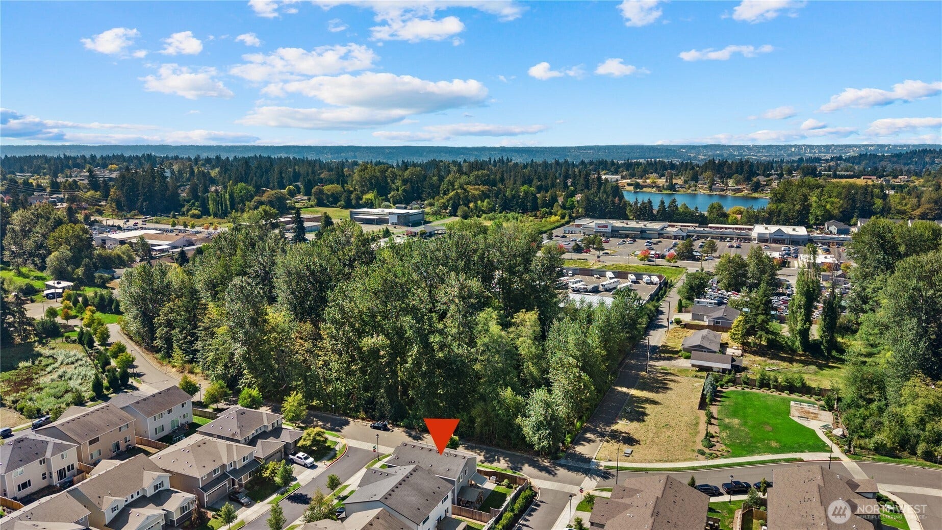 10419 11th Street Ct E, Edgewood, WA 98372 Enjoy the lush green adjacent to the home.