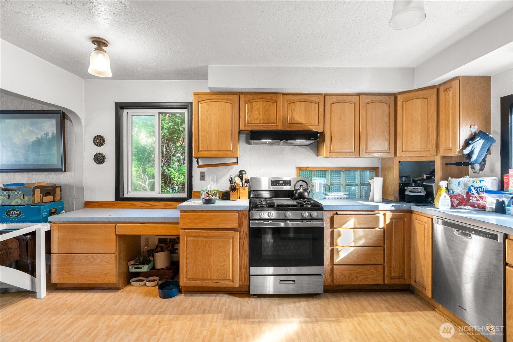 Kitchen showing lots of cabinets & counterspace