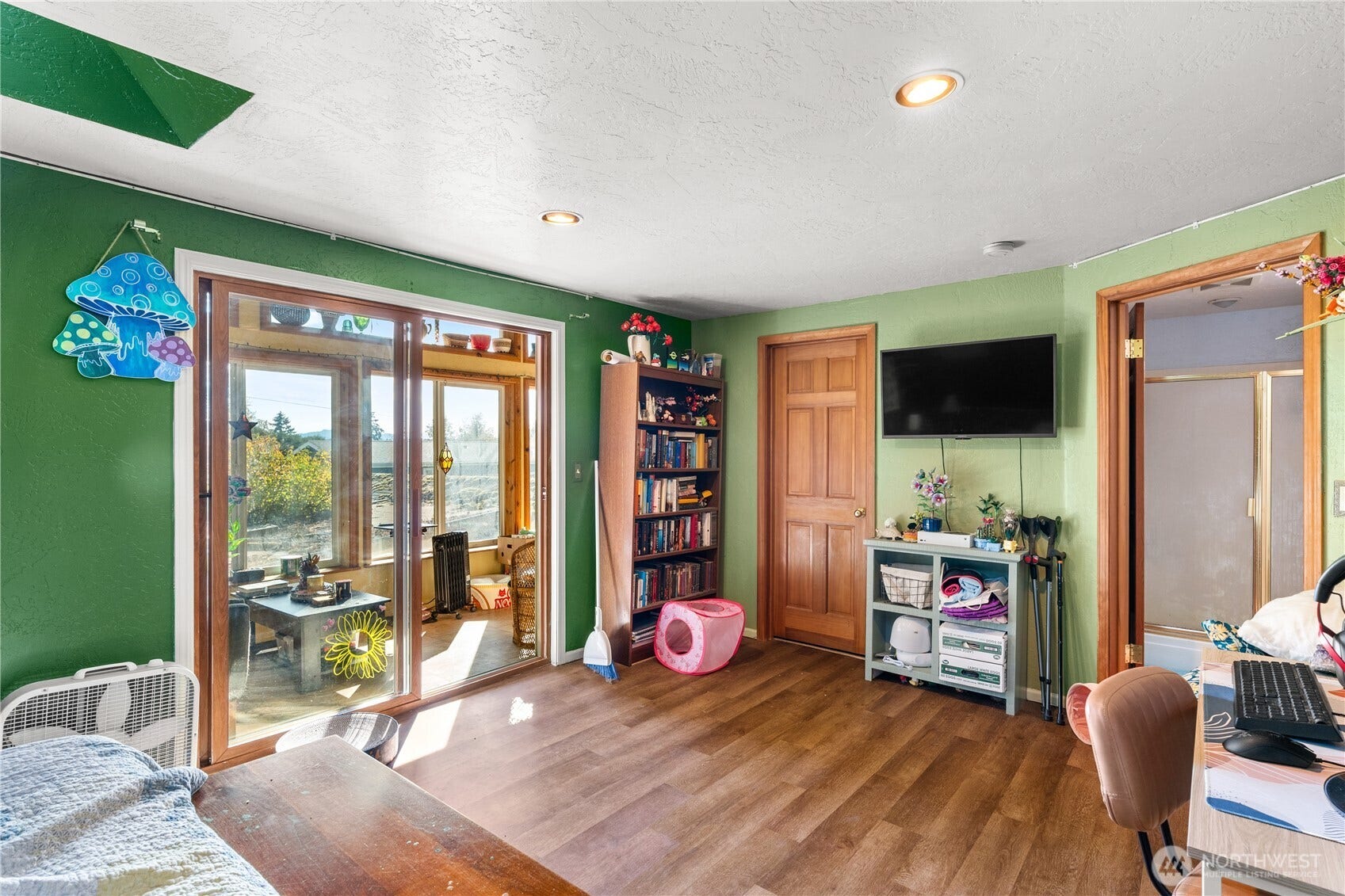 Primary room with sun room & skylights