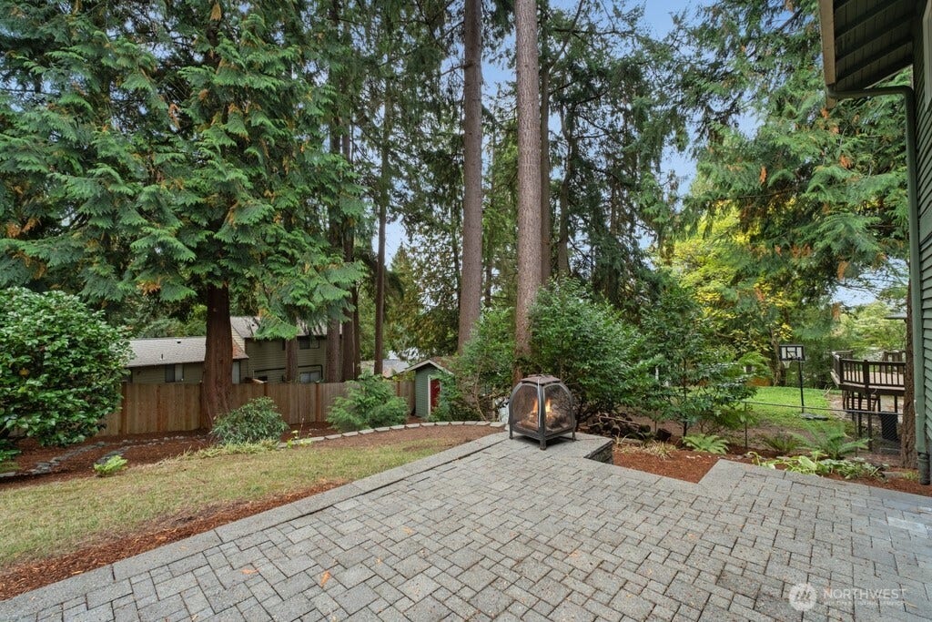 16817 NE 91st Street, Redmond, WA 98052 Fully fenced backyard and patio with outdoor shed