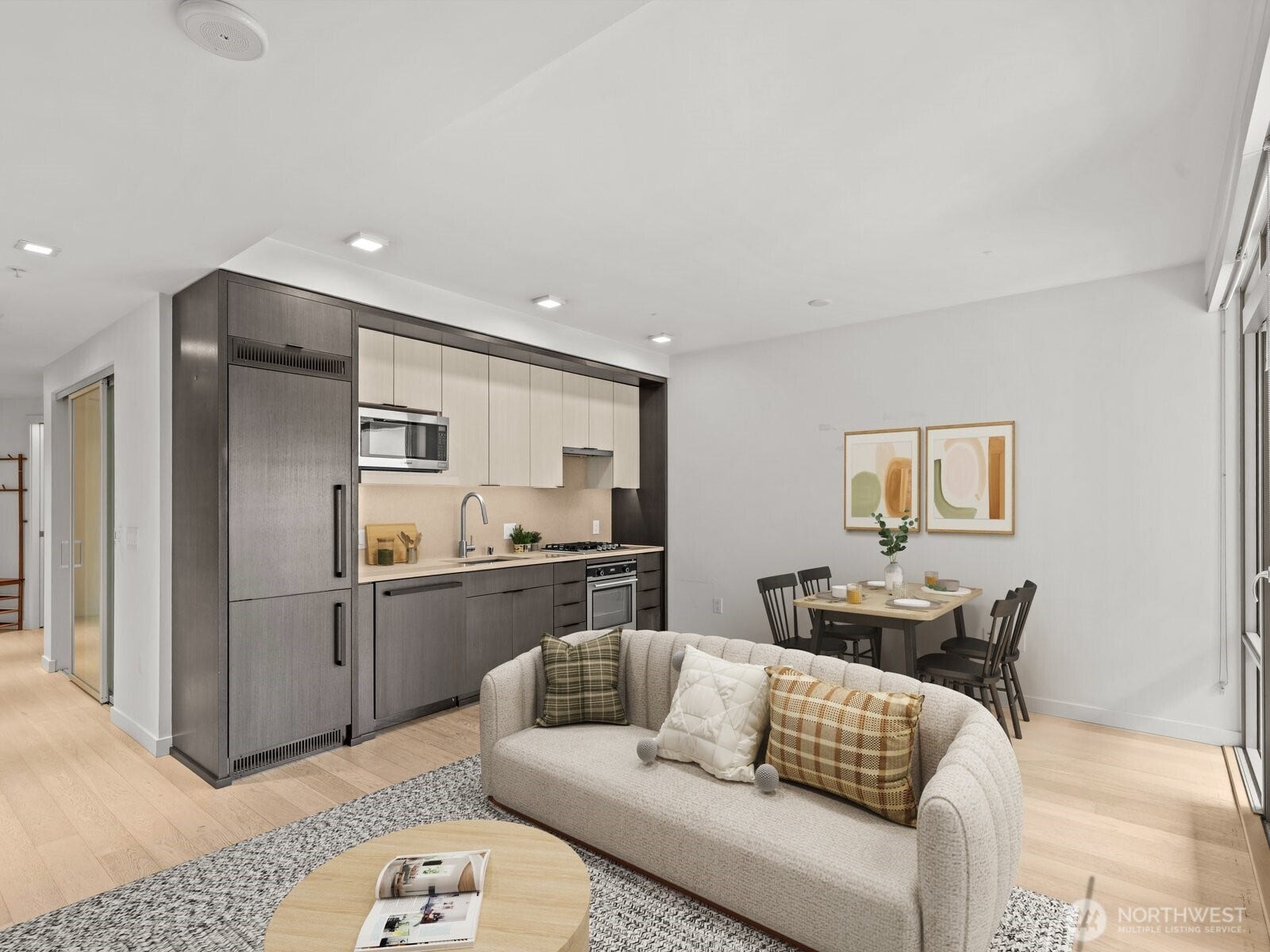 Virtually staged living and dining areas.