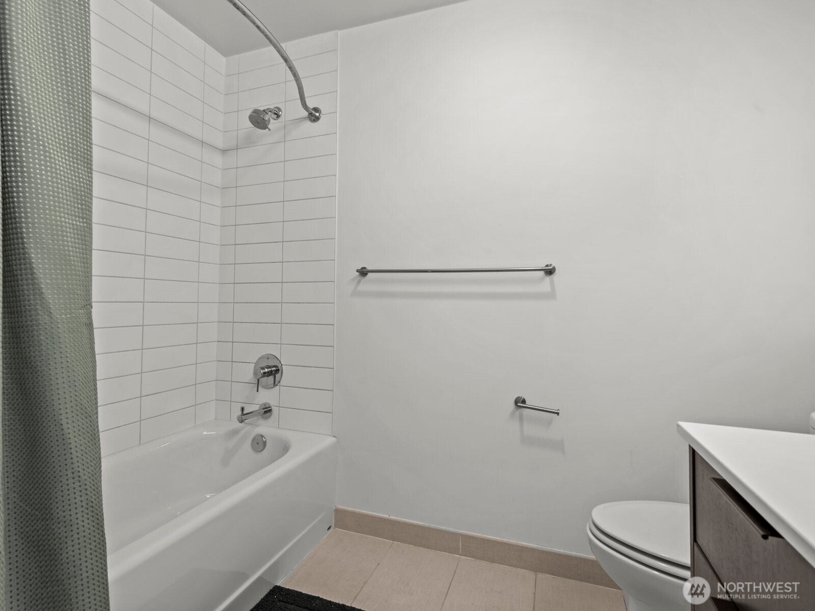 Nicely tiled shower.