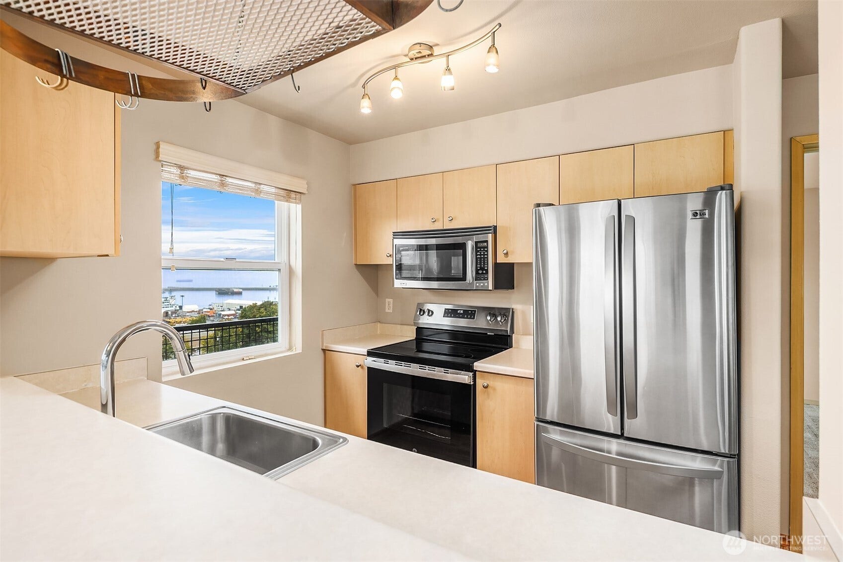 Kitchen with ample natural light & views.