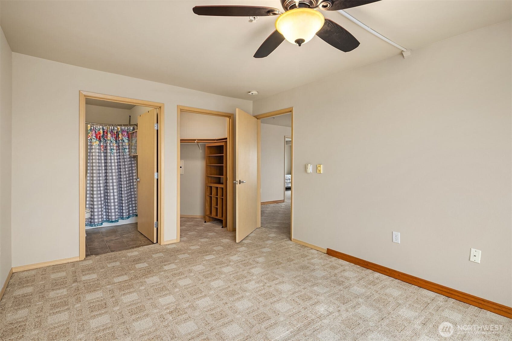 Primary bedroom with ensuite bath & walk in closet.