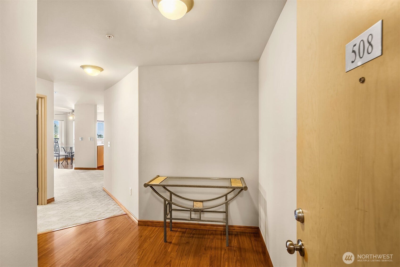 Welcome to this 2-bed, 2 bath corner unit condo at the Nautica Soundview.