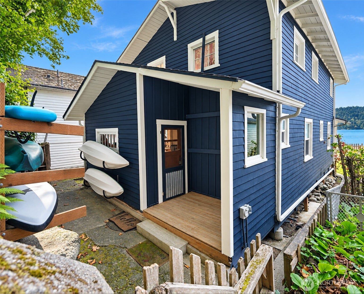 27730 Manzanita Beach Road SW, Vashon, WA 98070 The covered back porch is the perfect spot for your sandy boots and water sport paddles.