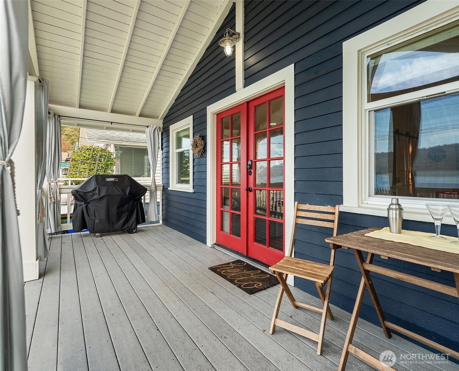 27730 Manzanita Beach Road SW, Vashon, WA 98070 The covered front porch is the perfect spot to watch the sun set, boats sailing in and out of the harbor, whales, seals, herons and osprey. Added bonus is being able to grill on a rainy day!