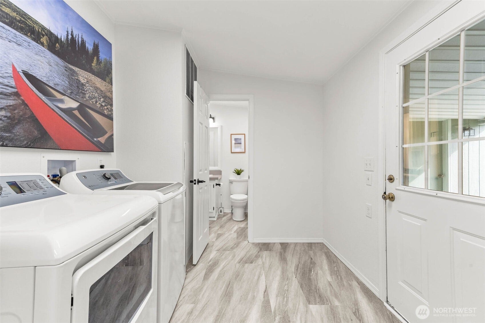 5081 E Gray Sea Eagle Lane SW, Tumwater, WA 98512 Back entry with laundry room, and access to main bathroom.
