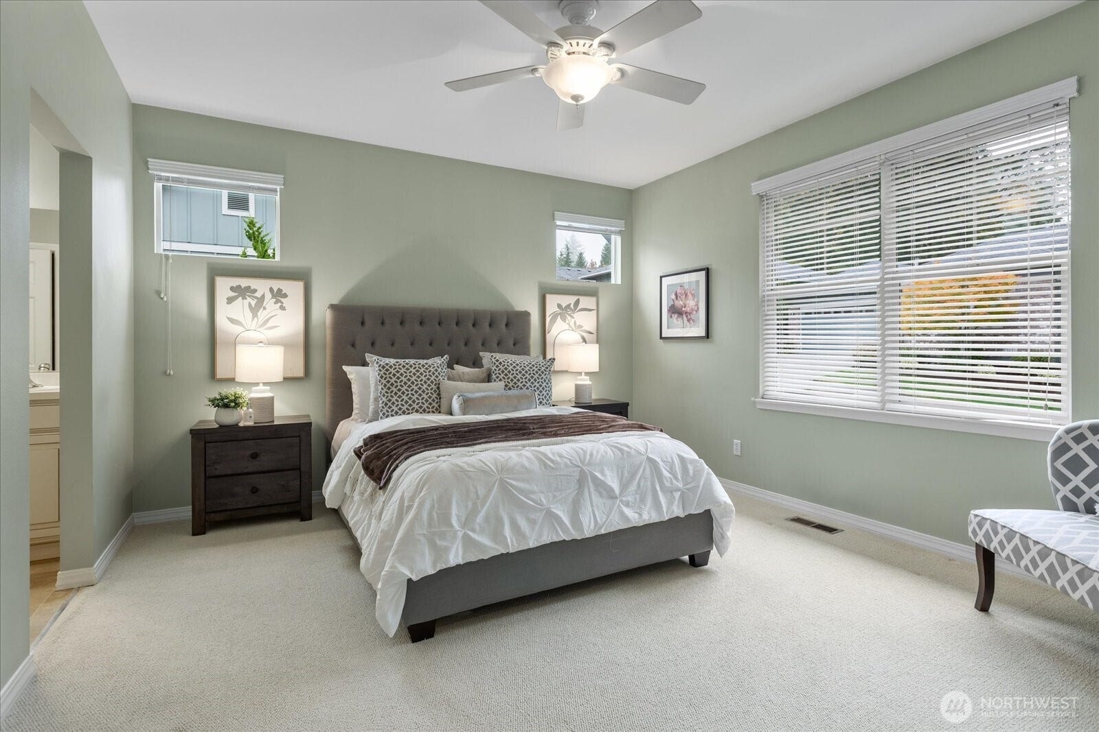 13233 239th Way NE, Redmond, WA 98053 The primary bedroom is located at the end of the hallway, featuring an ensuite bath.