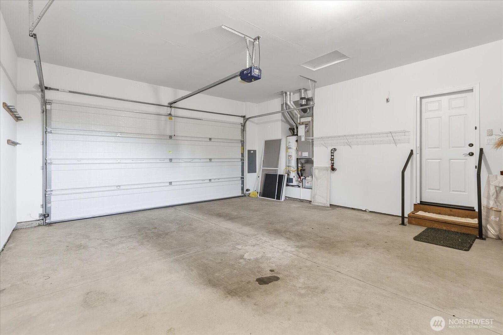 13233 239th Way NE, Redmond, WA 98053 A spacious garage for your cars and extra storage as well.