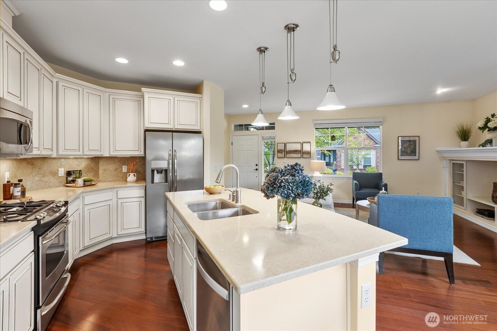 13233 239th Way NE, Redmond, WA 98053 The cabinets are a beautiful accent to the brazilian cherry floors.