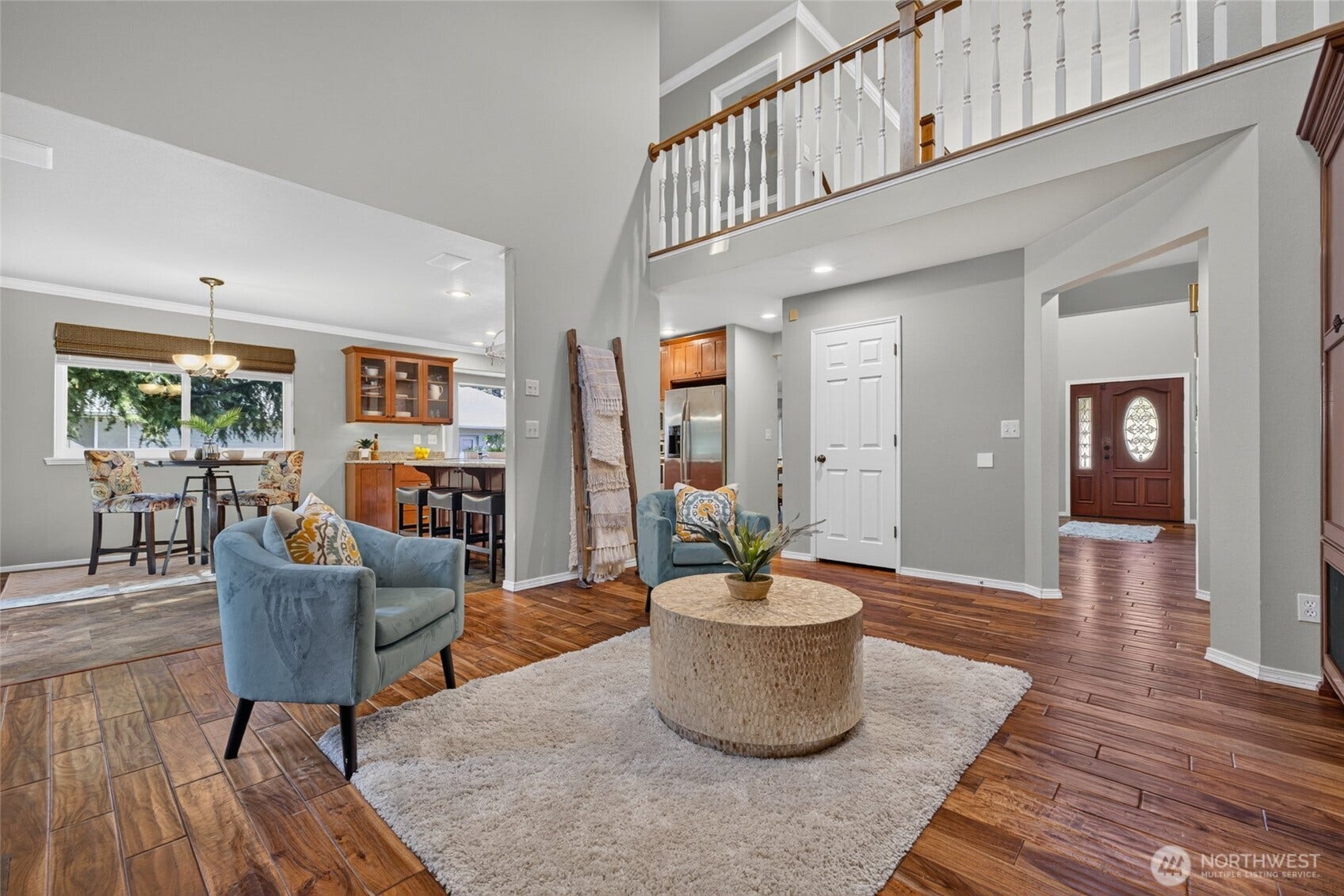 Catwalk on upper level oversees the living room.