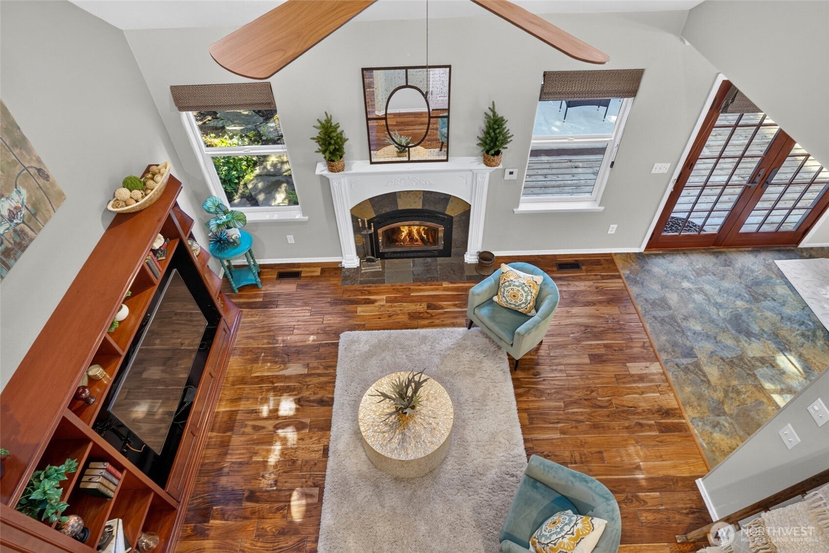 Catwalk on upper level oversees the living room.