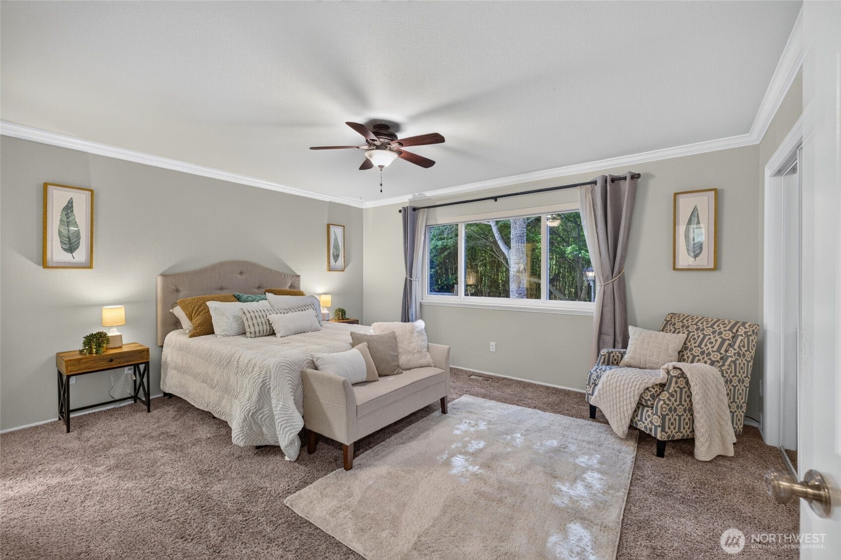 Primary suite is on main level and has double closets and ceiling fan.