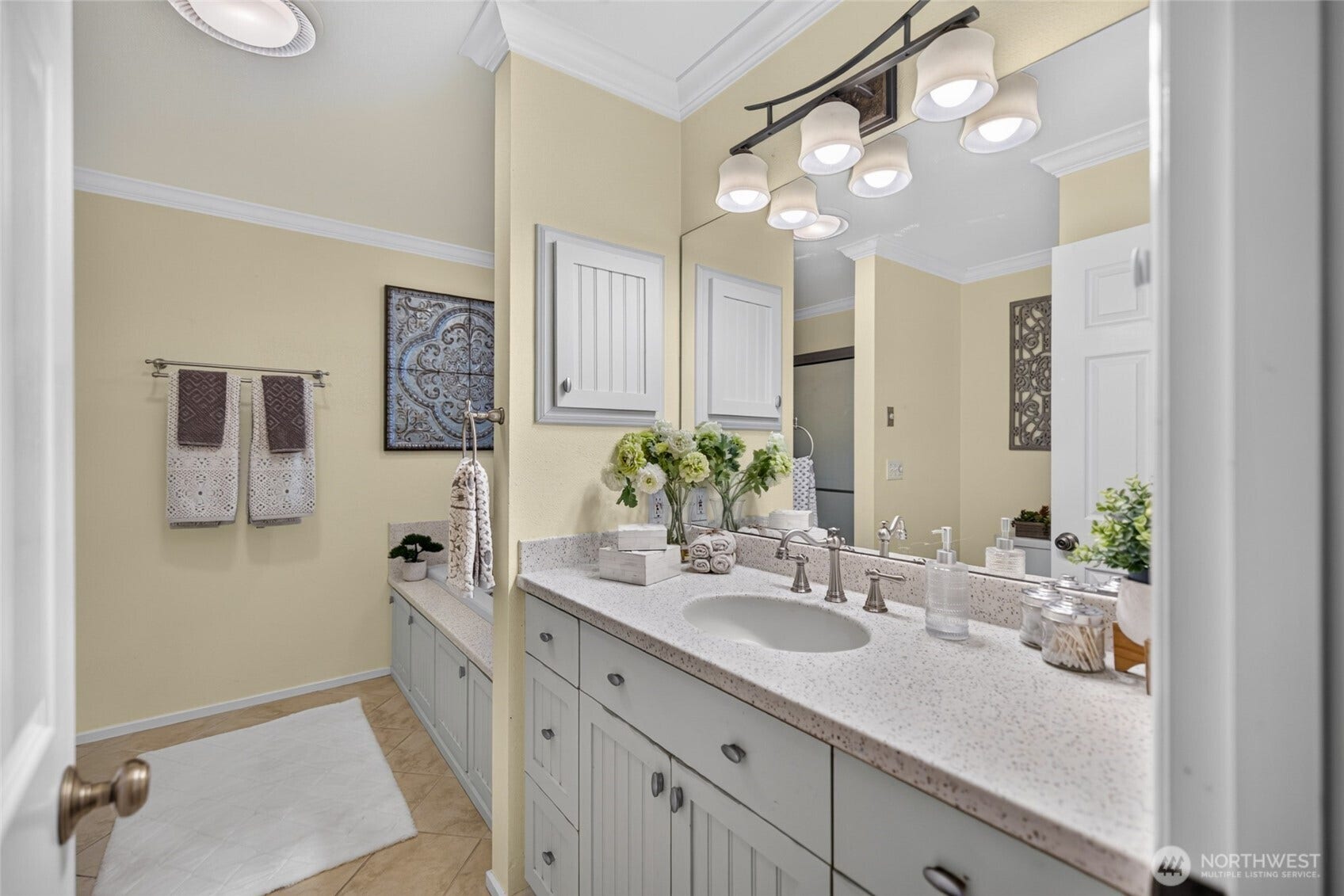 Primary bathroom with jetted tub and separate shower.