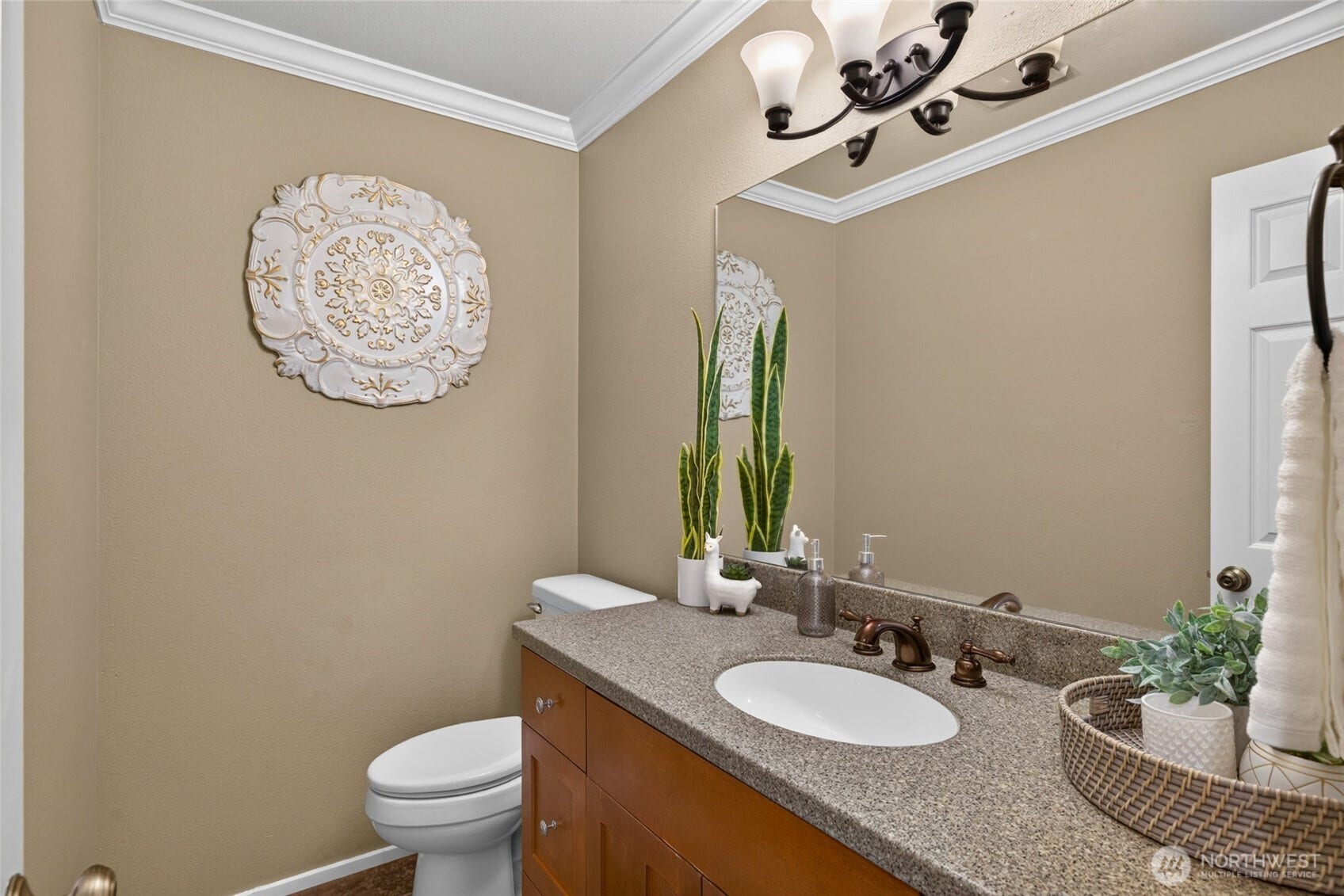 This half bathroom serves the lower level.