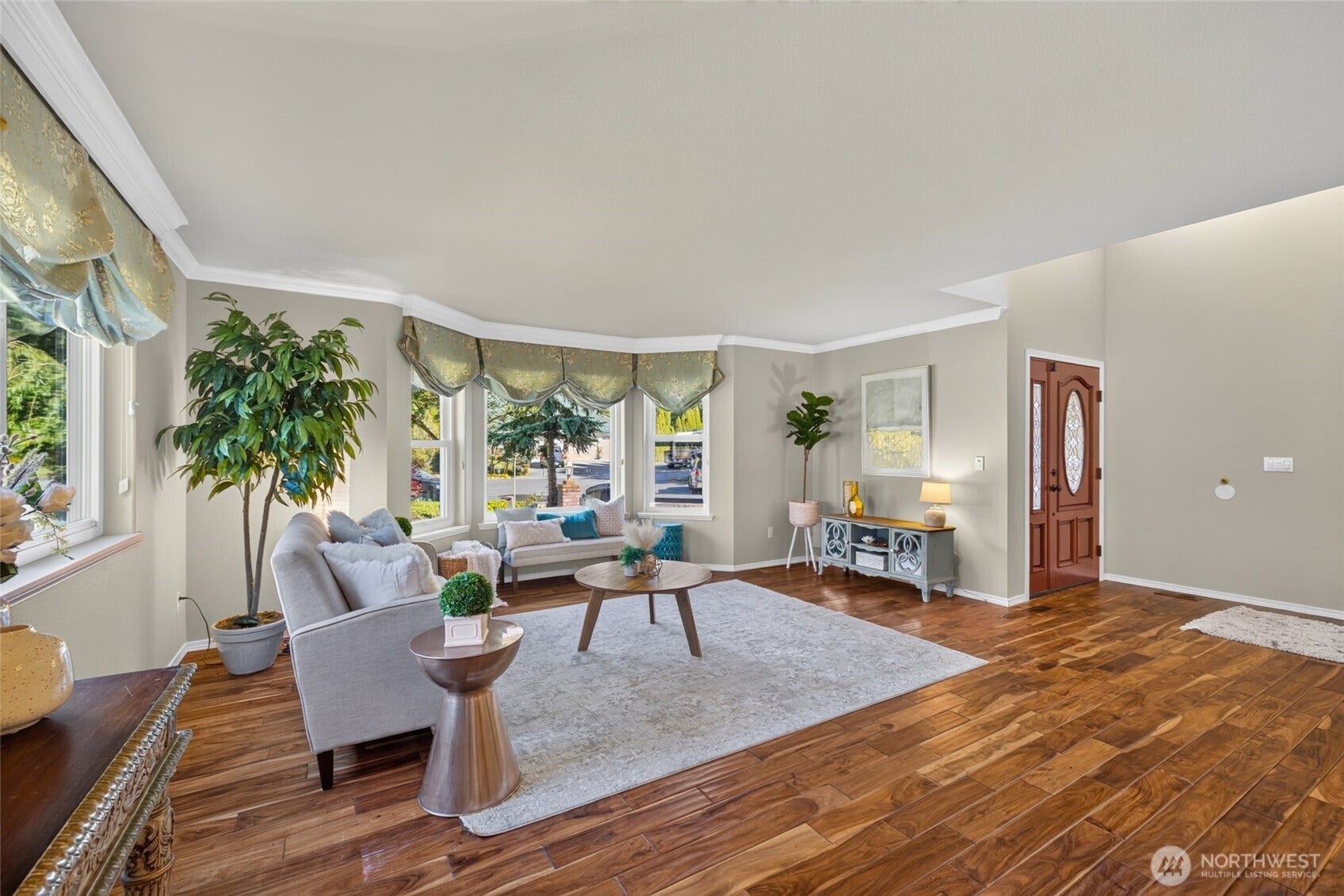 Entering the front door on your right is the expansize living room.