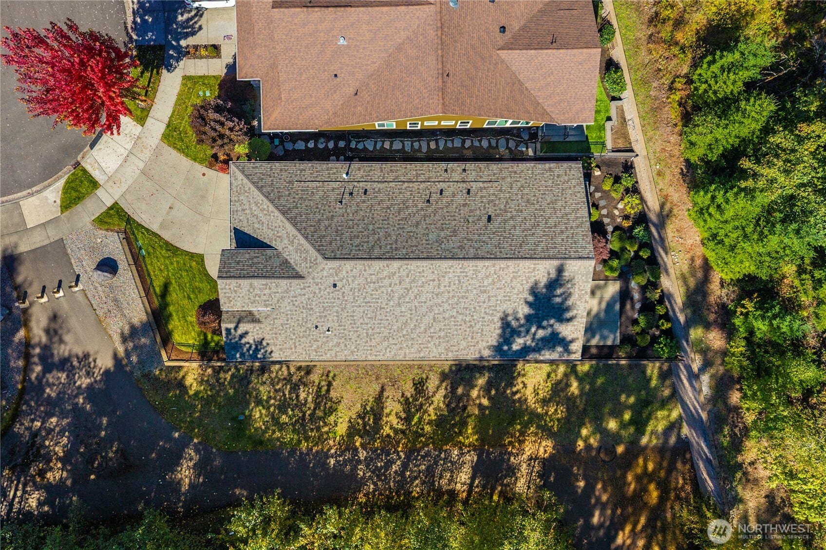 14721 Knoll Park Court E, Bonney Lake, WA 98391 The elevated, corner lot is one of a kind! Complete privacy and views from nearly every window!Extra long driveway, garage has a 2' extension, brand new roof.