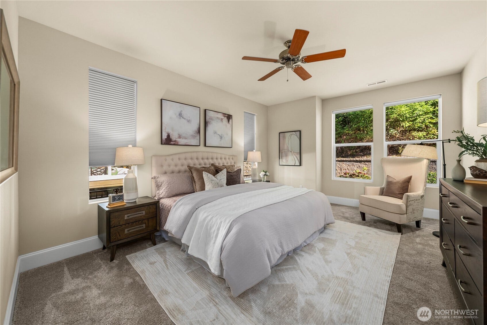 14721 Knoll Park Court E, Bonney Lake, WA 98391 The spacious primary bedroom overlooks the private outdoor space. Brand new carpet.