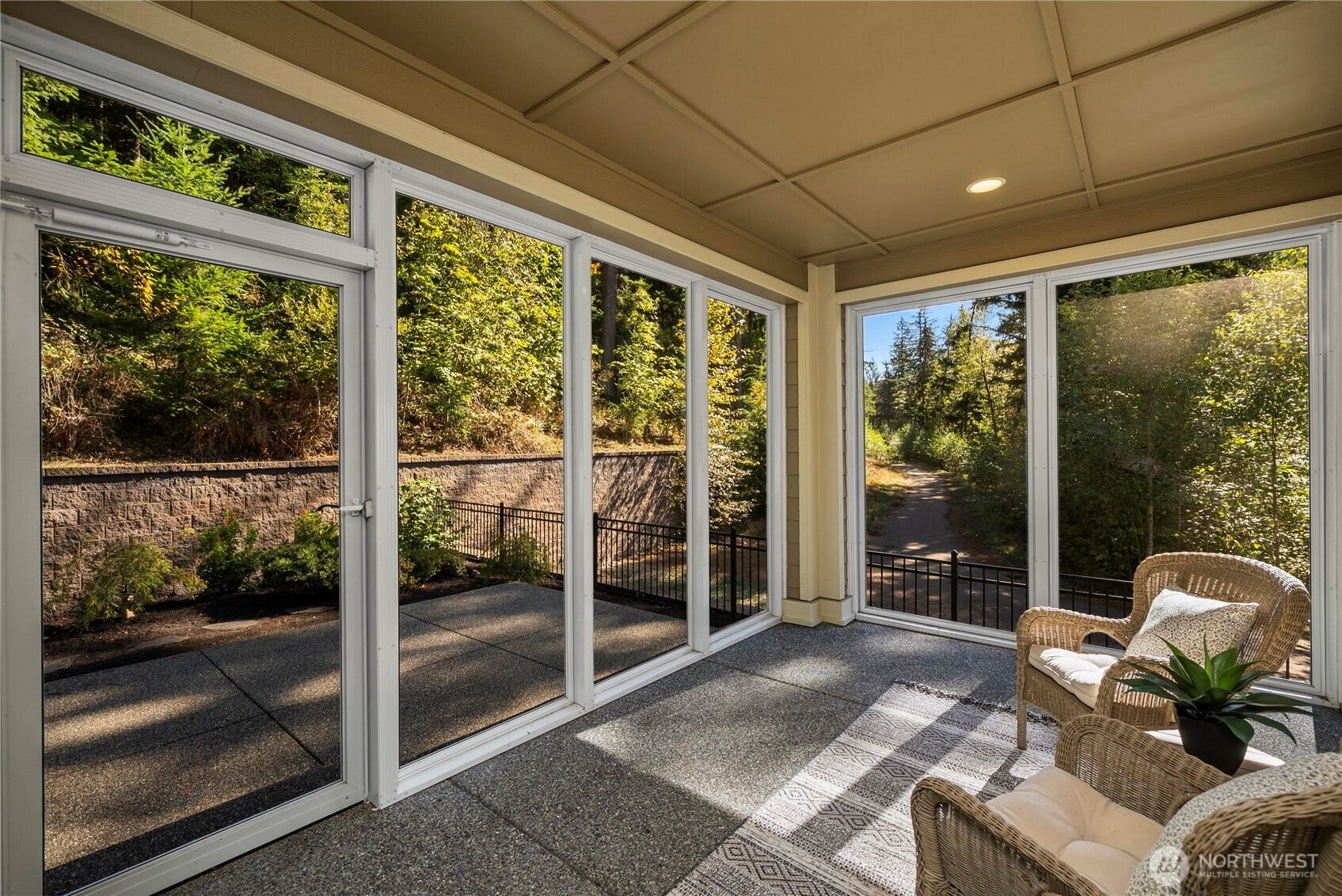 14721 Knoll Park Court E, Bonney Lake, WA 98391 The custom enclosed sun porch expands the indoor outdoor living!