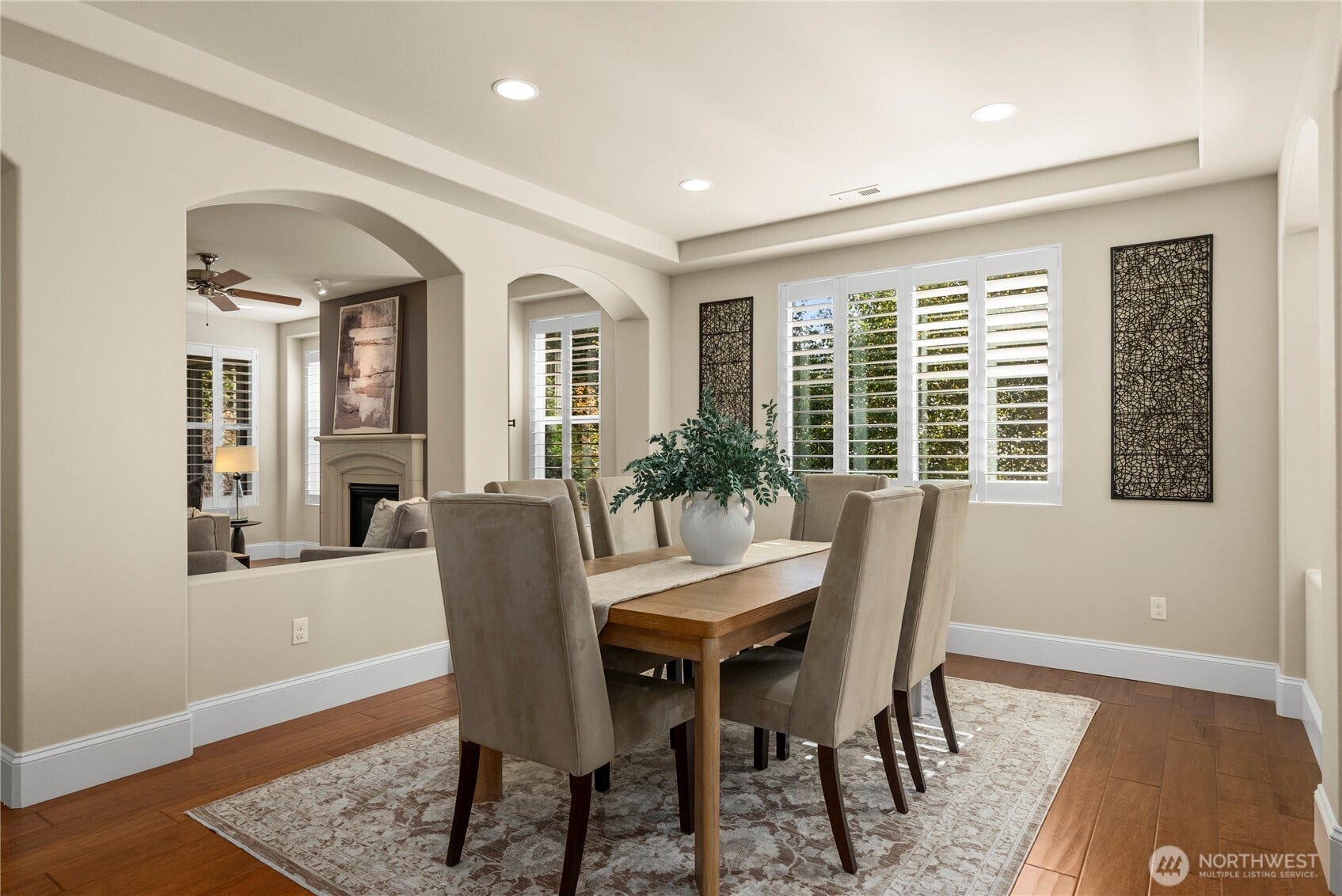 14721 Knoll Park Court E, Bonney Lake, WA 98391 The dining room with a tray ceiling also enjoys views of the tress and so much natural light.