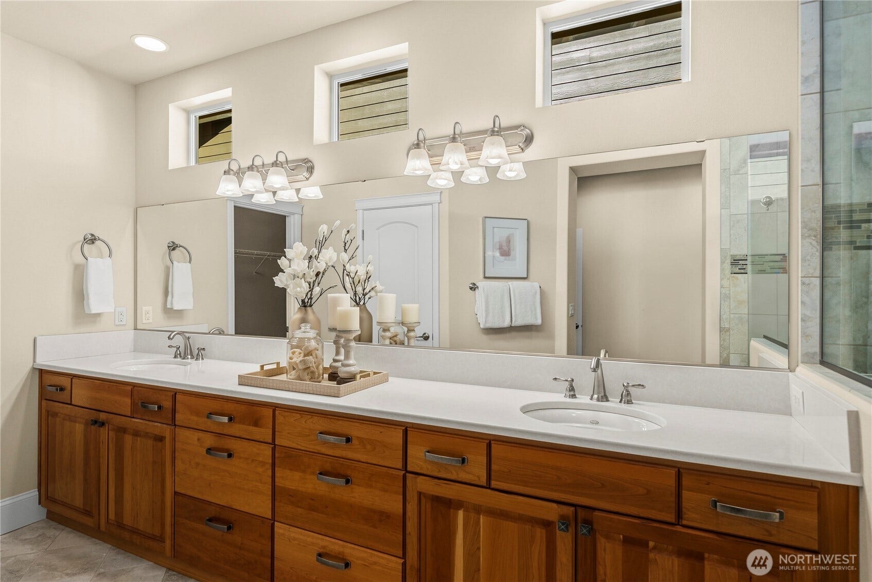 14721 Knoll Park Court E, Bonney Lake, WA 98391 Gorgeous spa-like primary bath with Quartz counters and tile floors. Huge walk-in closet.