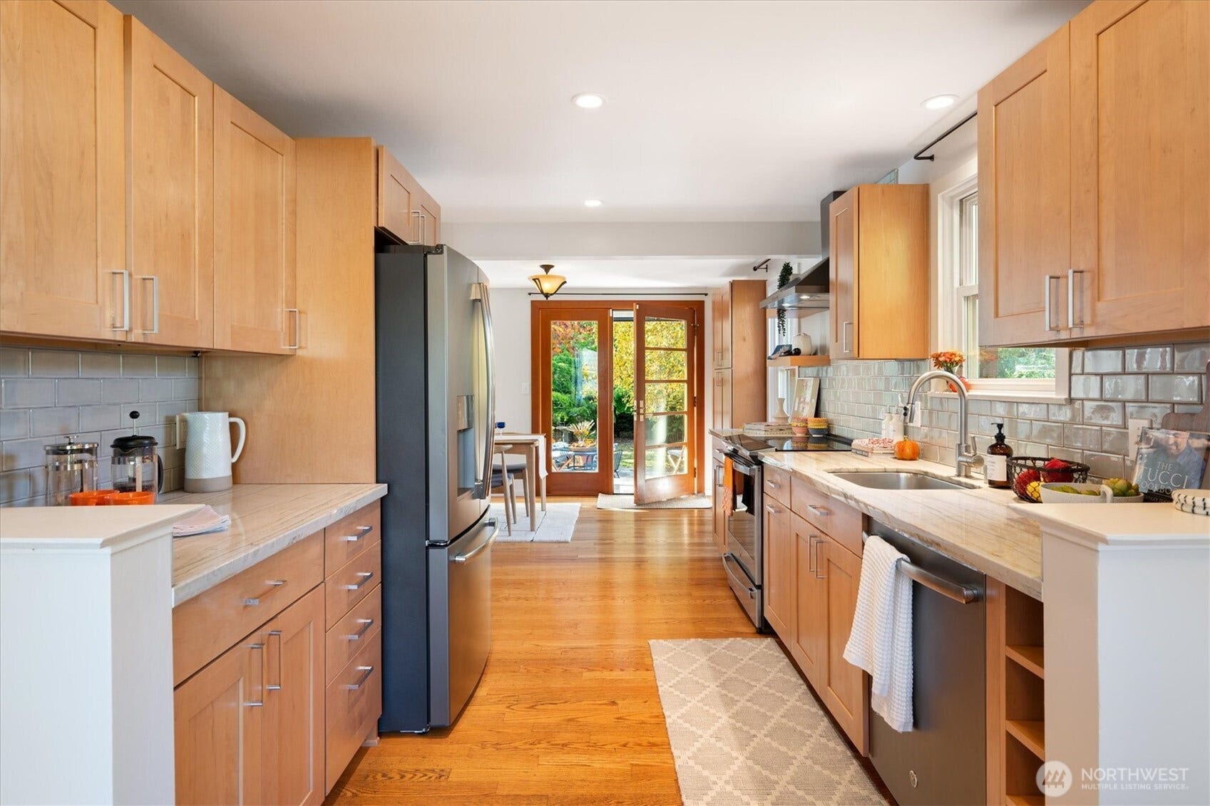 10523 13th Avenue NW, Seattle, WA 98177 The flow is ideal with a wide Galley-style Kitchen with oak floors.