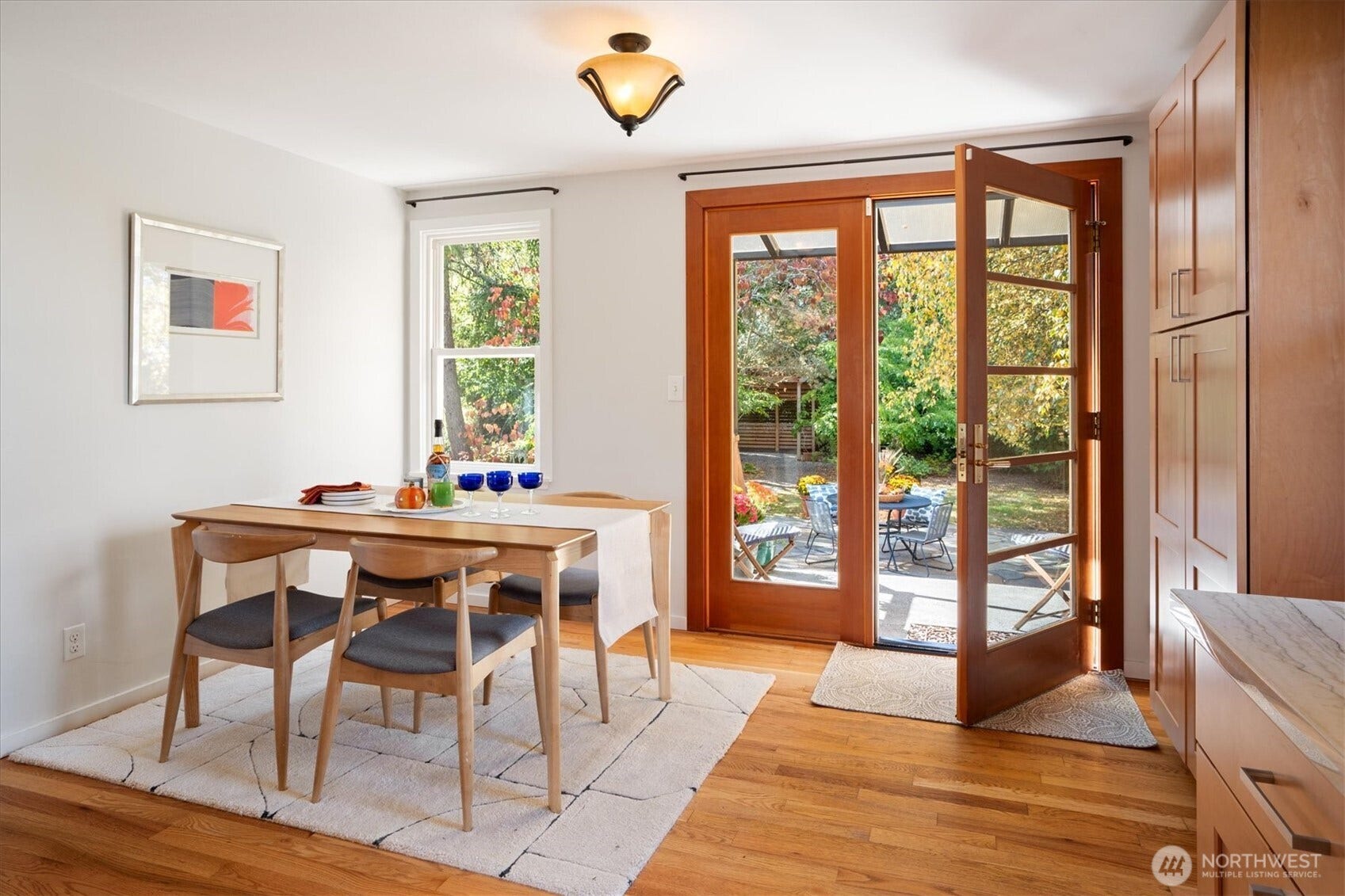 10523 13th Avenue NW, Seattle, WA 98177 The Dining room opens to the Sunny Backyard, ideal for every day living & entertaining.