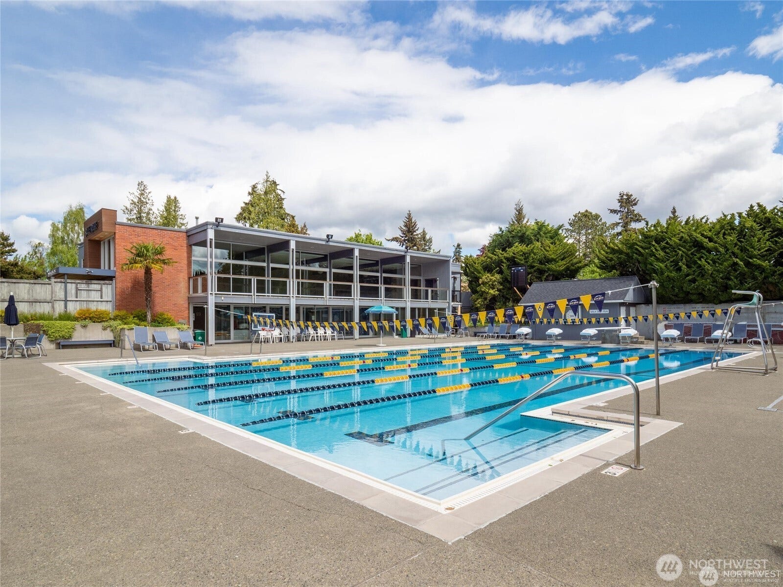 10523 13th Avenue NW, Seattle, WA 98177 This incredible swimming pool and the club house also pictured here are other special amenities in Blue Ridge.
