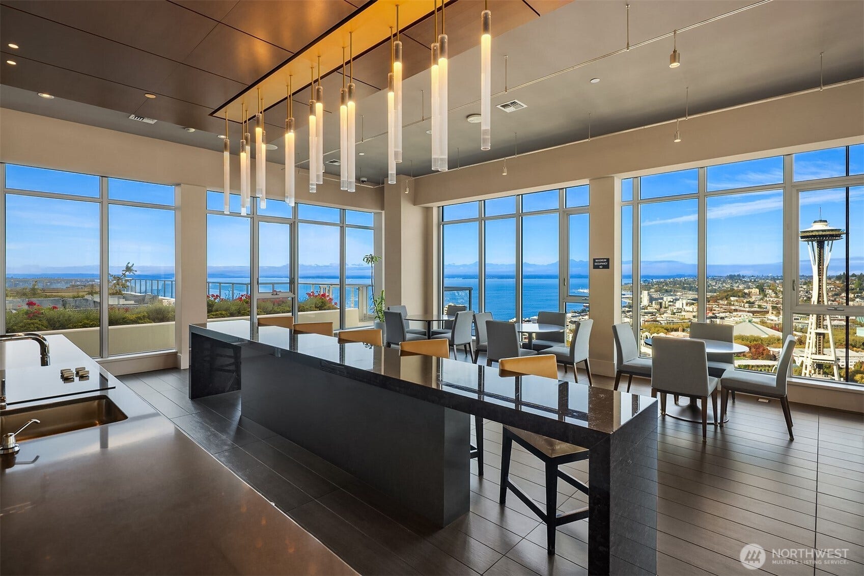 583 Battery Street, #3604N, Seattle, WA 98121 On the 41st floor floor to ceiling windows in the Sky Retreat Resident Lounge with panoramic views has a kitchen, bar, dining space and TV lounge, great for private parties