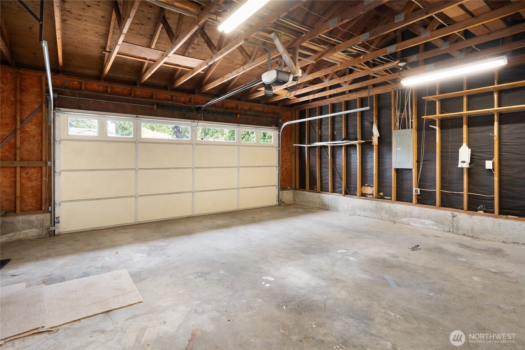 Large attached 2 car garage with access to huge backyard.