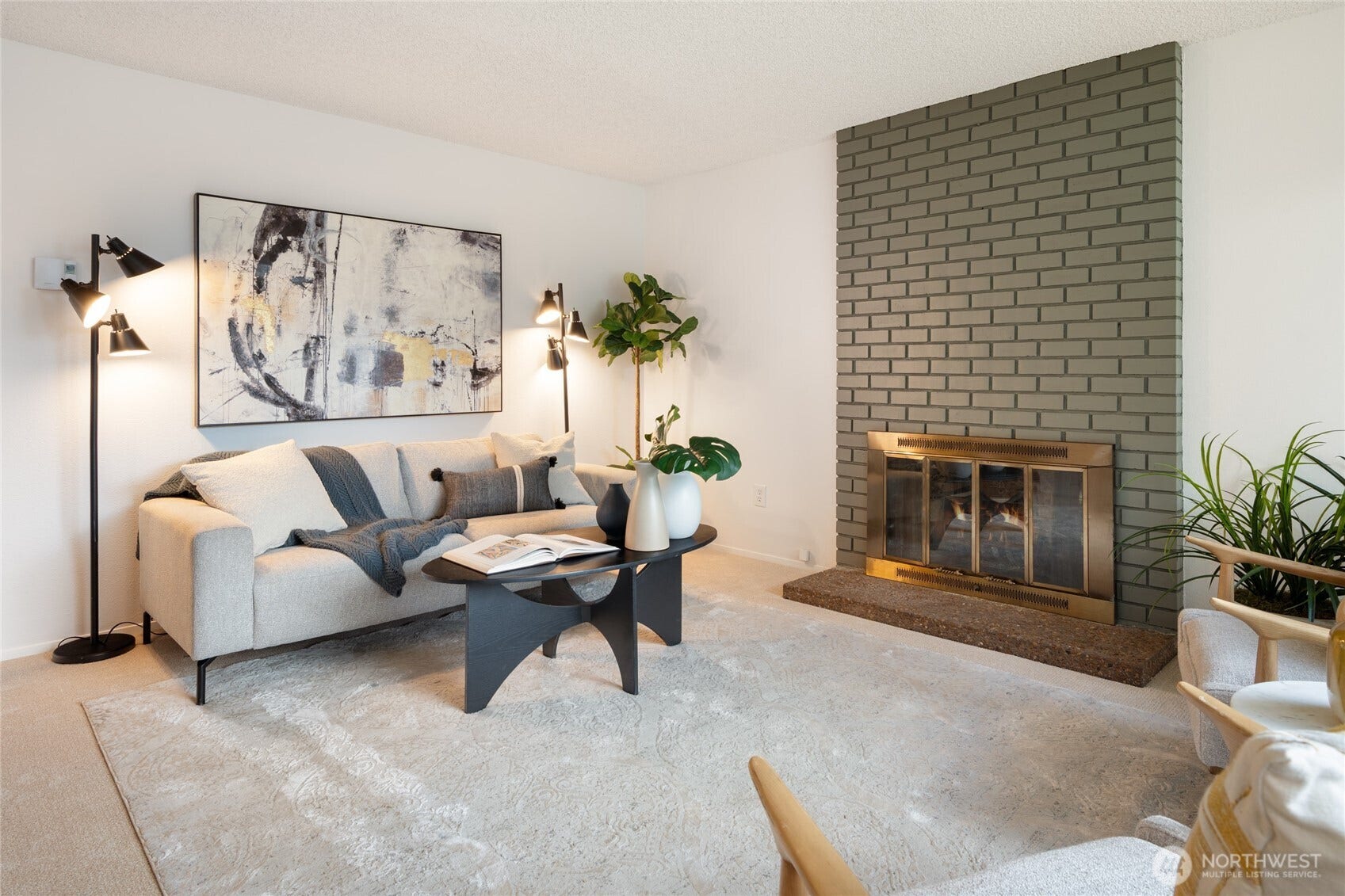 Freshly painted rooms and fireplace make this space sparkle.