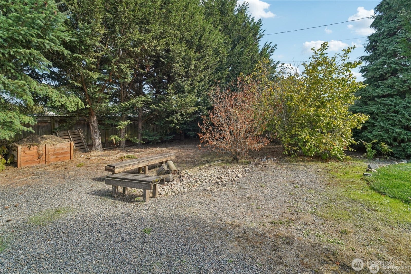 9315 121st Street SW, Lakewood, WA 98498 fully fenced yard with fire pit and room for so much more.