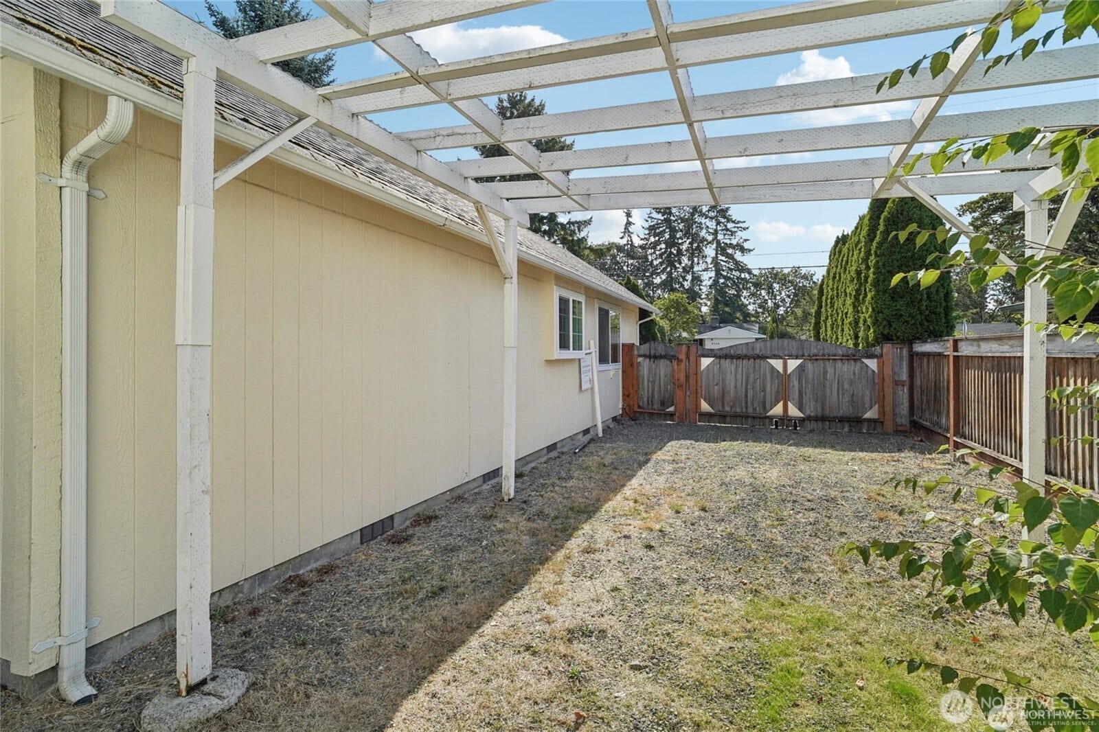 9315 121st Street SW, Lakewood, WA 98498 Side yard and gate, perfect to store a trailer, or?