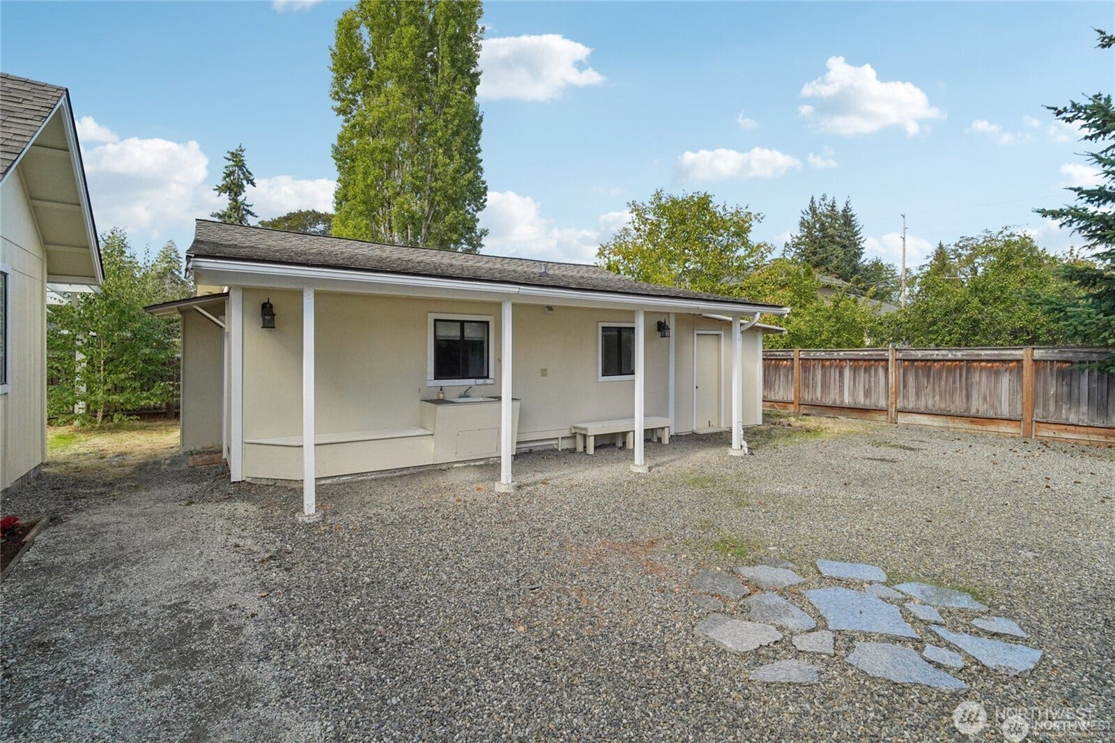 9315 121st Street SW, Lakewood, WA 98498 two car garage and storage area through the door to the right.
