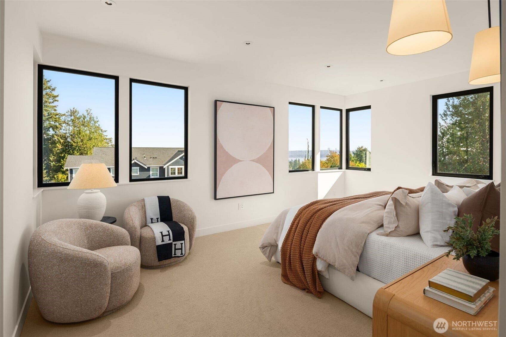6021 Princeton Avenue NE, Seattle, WA 98115 Large primary suite with views of Lake Washington and the Cascades.
