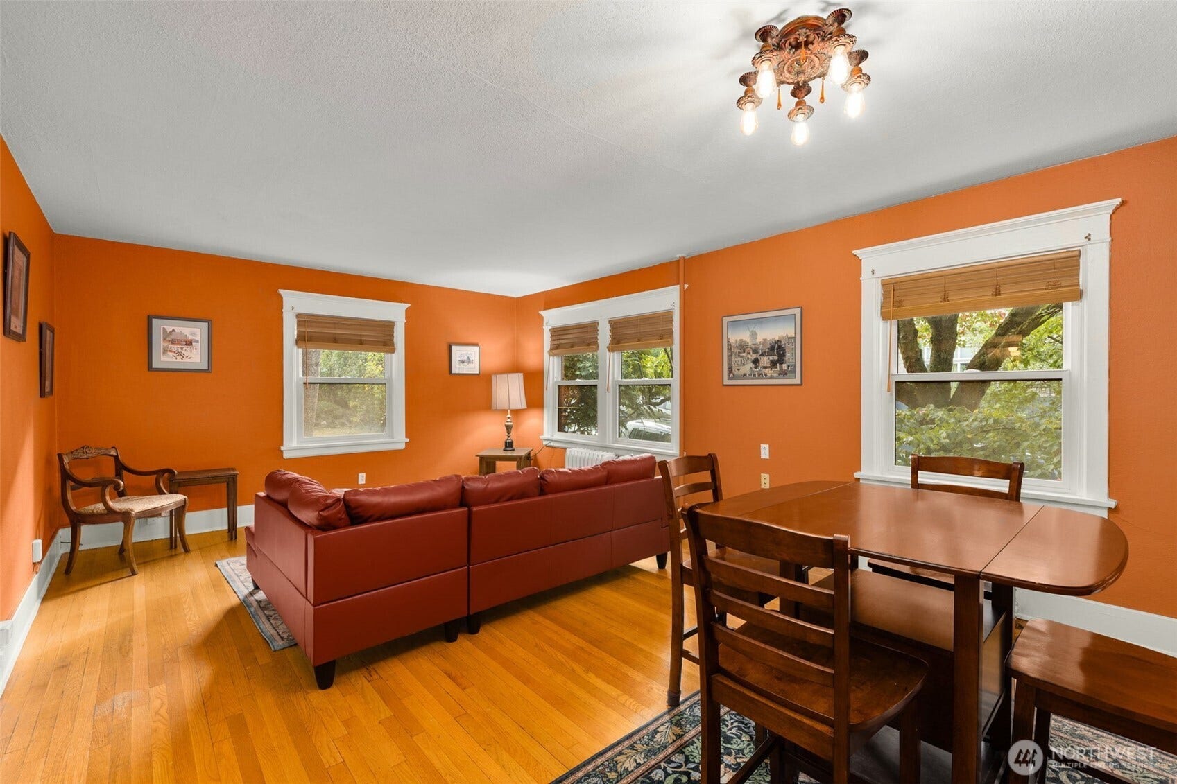 516 E Thomas Street, #102, Seattle, WA 98102 With 653sf, this home feels expansive, featuring a generous living & dining room layout framed by trees that beautifully change with the seasons-perfect for entertaining.