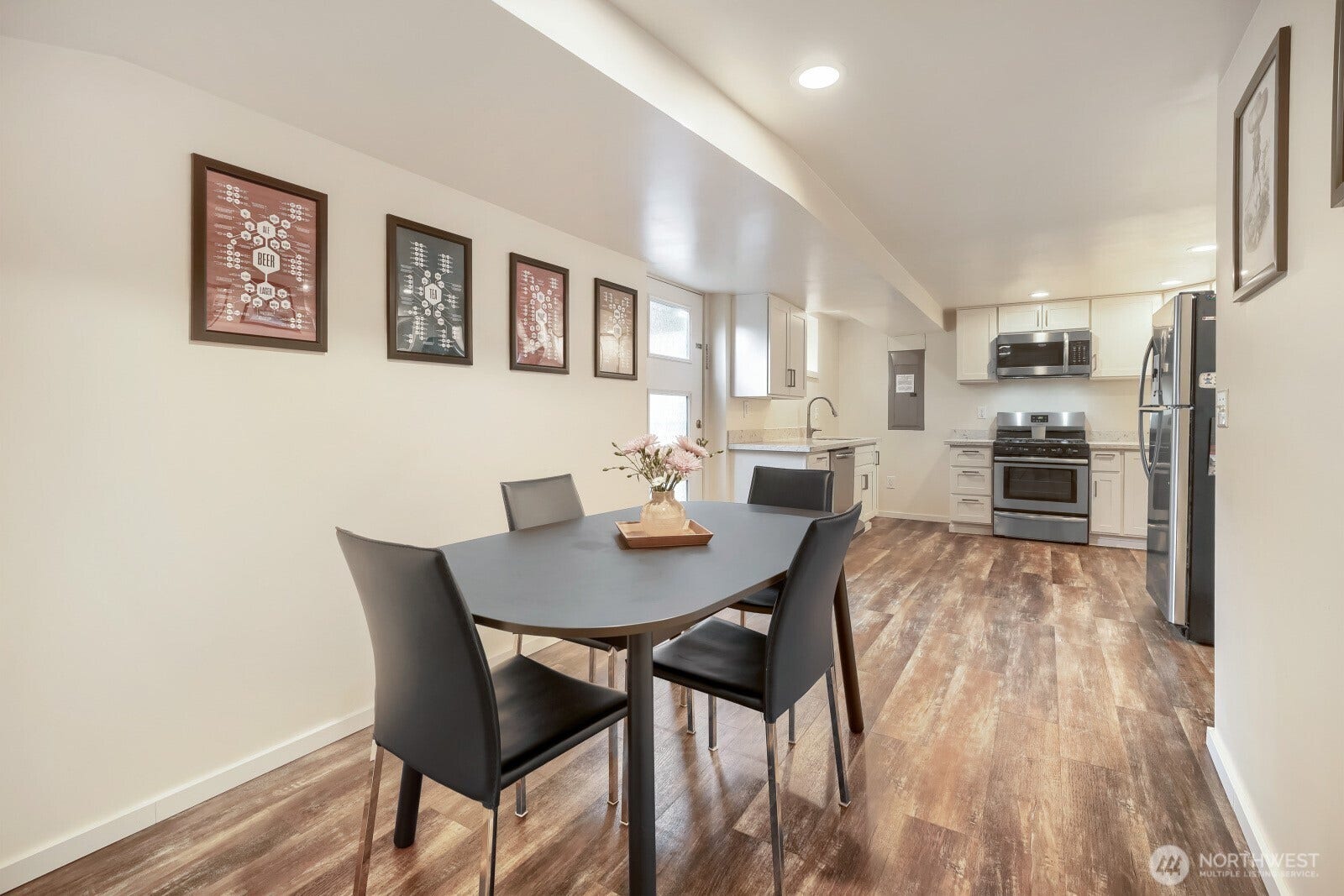 5013 N 33 Street, Tacoma, WA 98407 Dining area in lower apartment features its own door to the shared back yard.