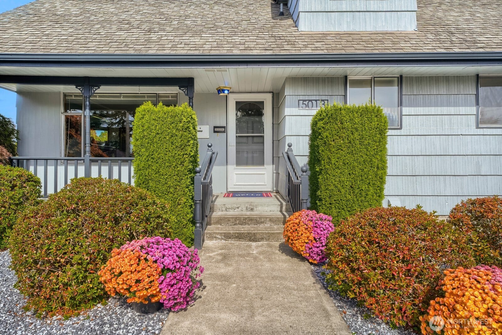 5013 N 33 Street, Tacoma, WA 98407 Low maintenance landscaping plus easy entrance with just three steps to a main floor that features a primary bedroom and full bath make living easy.