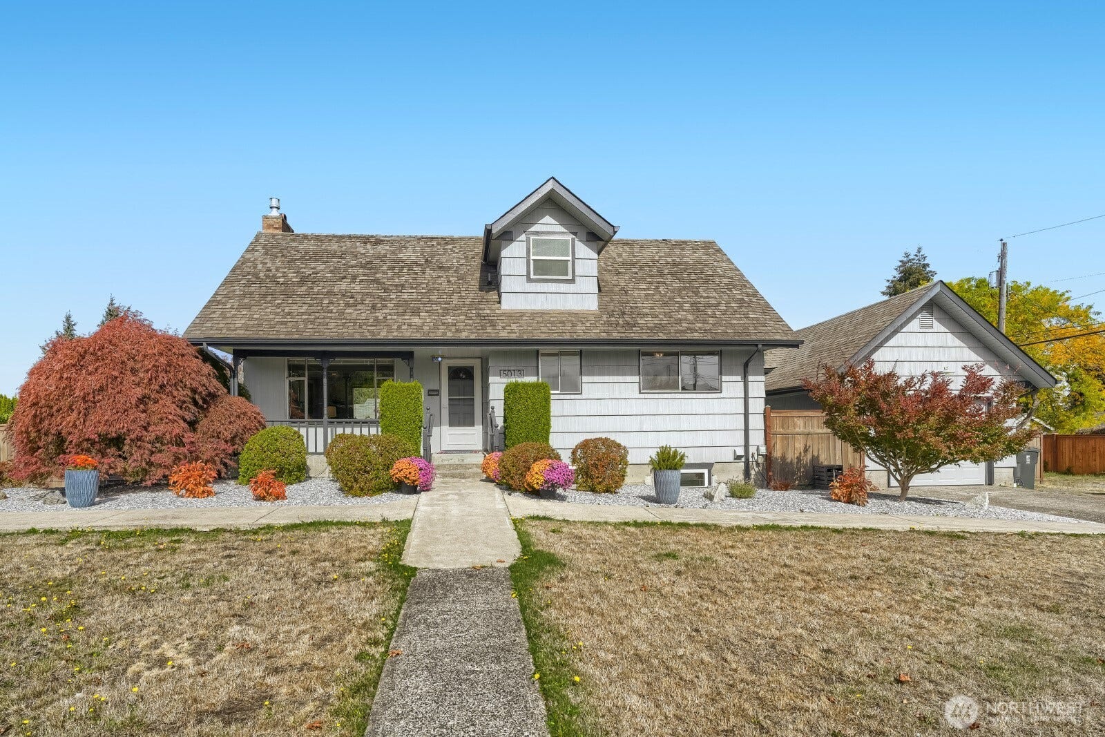 5013 N 33 Street, Tacoma, WA 98407 Eureka! solid mid century 1956 construction meets 21st century flex with a charmingly adaptable 3 bed / 2 bath main home and a 1 bed / bath lower unit apartment with its own address, front door and full utilities plus a detached garage and hobby/ workshop!