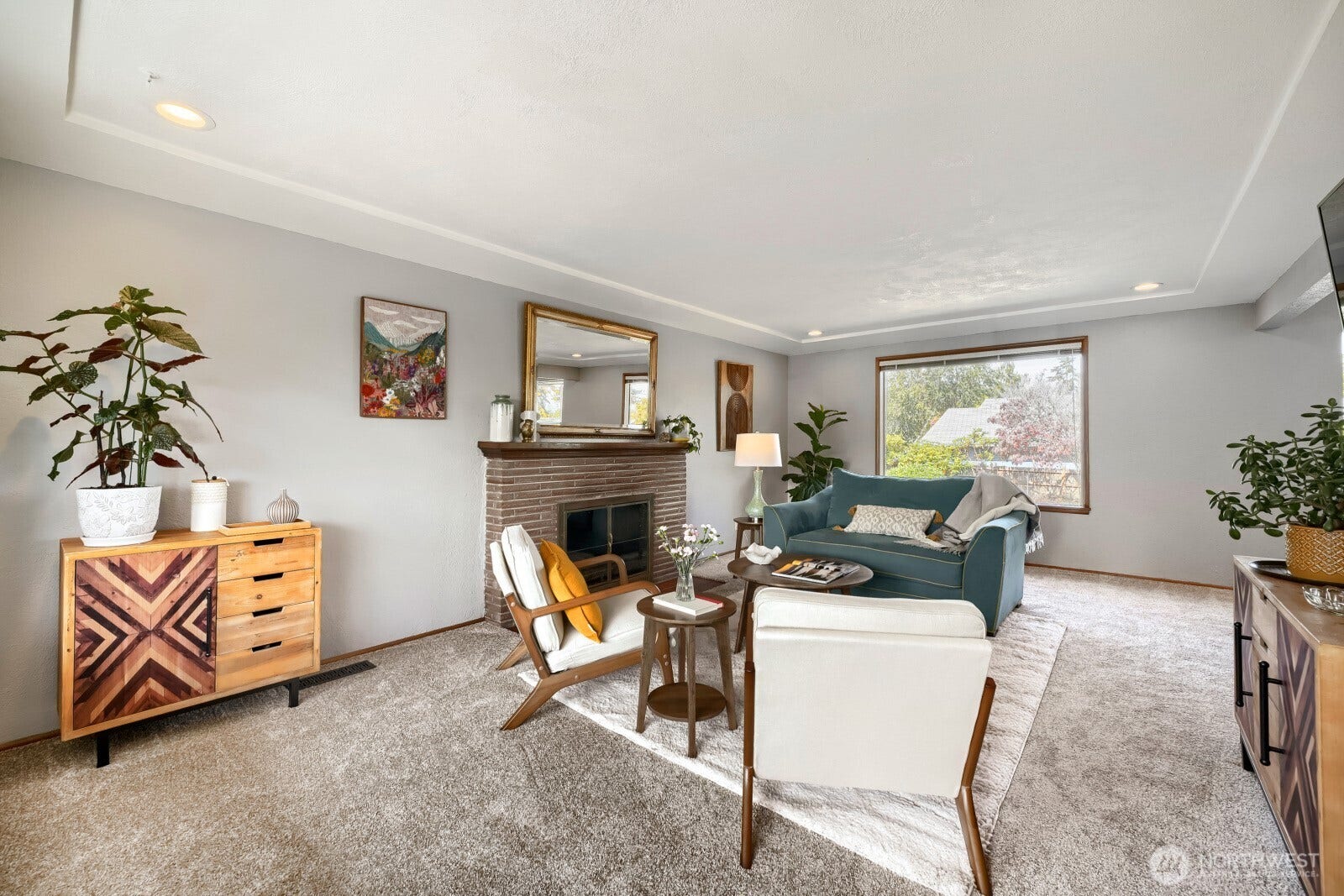 5013 N 33 Street, Tacoma, WA 98407 WOW - this main floor living room with original mid century coffered ceiling, lighting updates, new carpet over beautiful oak hardwoods, and a large layout allow ultimate flexibility to enjoy the oversize windows with South and North exposures