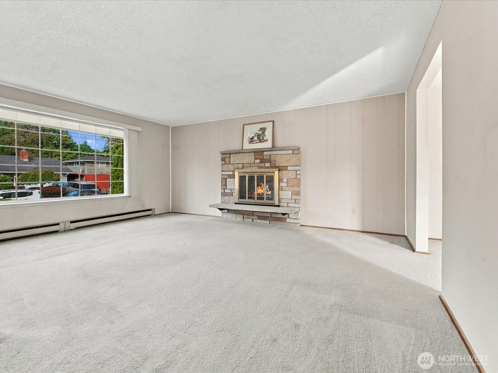 7637 Tacoma Avenue S, Tacoma, WA 98408 Just imaging your holiday decor in this spacious living room. The estate says there are Hard Wood floors under the carpet.