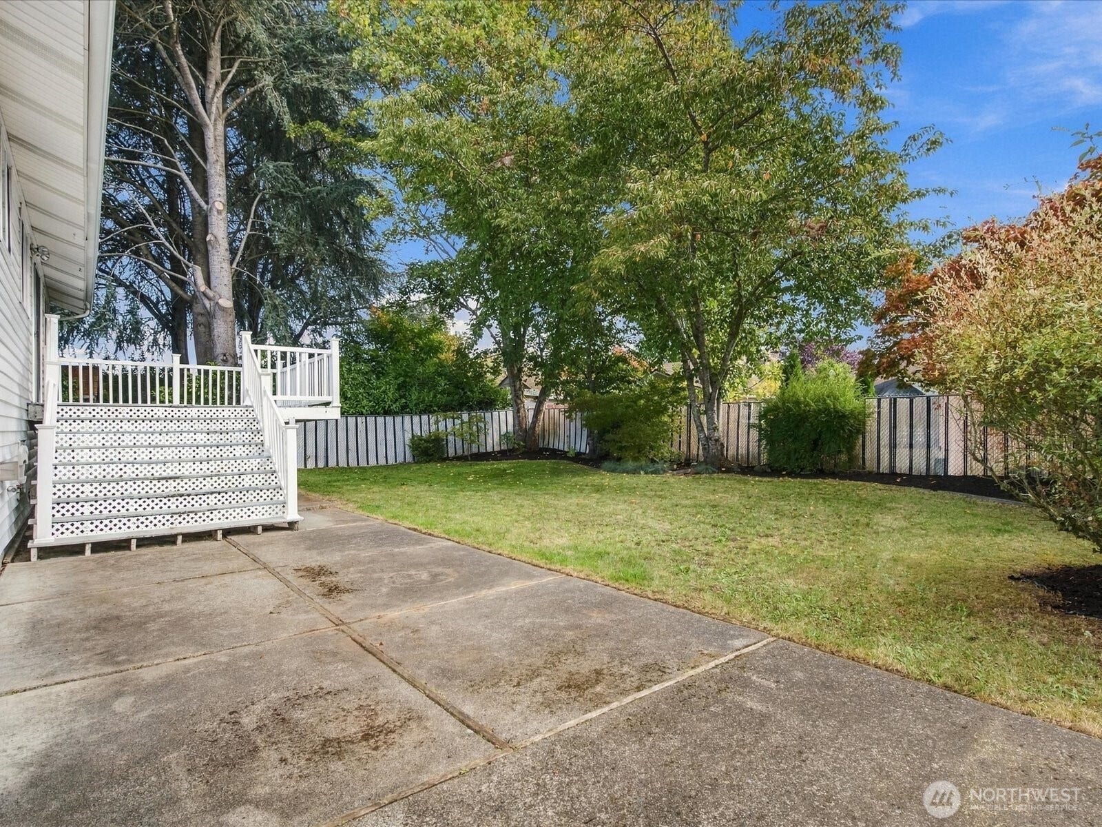 7637 Tacoma Avenue S, Tacoma, WA 98408 Entertain and enjoy both the deck and patio this Fall