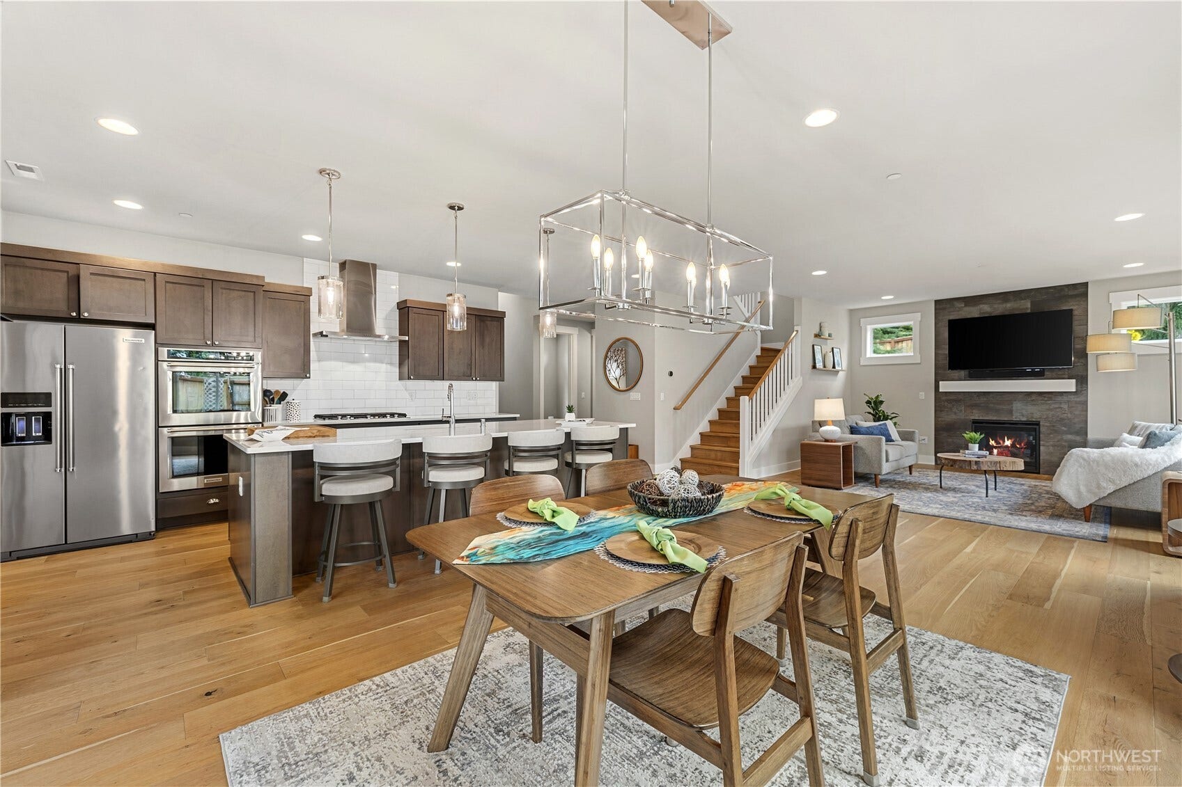 Open concept dining, kitchen and living areas