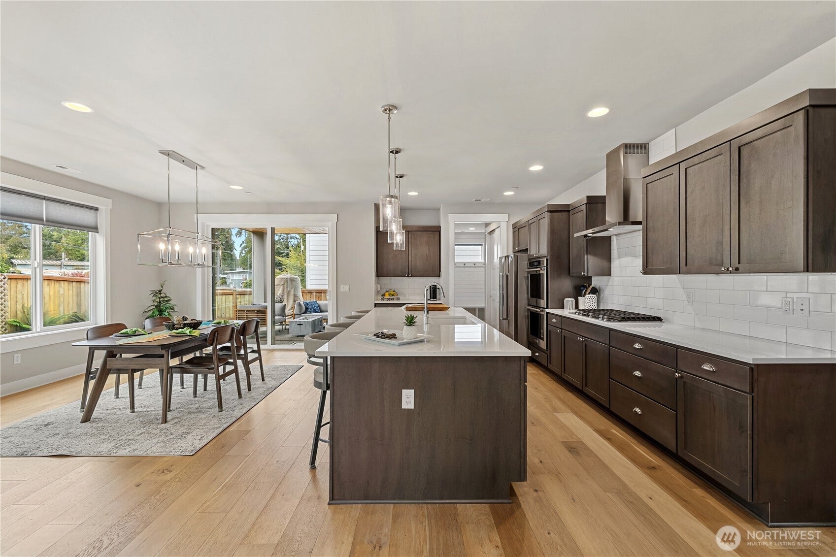 Kitchen and dining areas. Showing access to the outdoor living space.