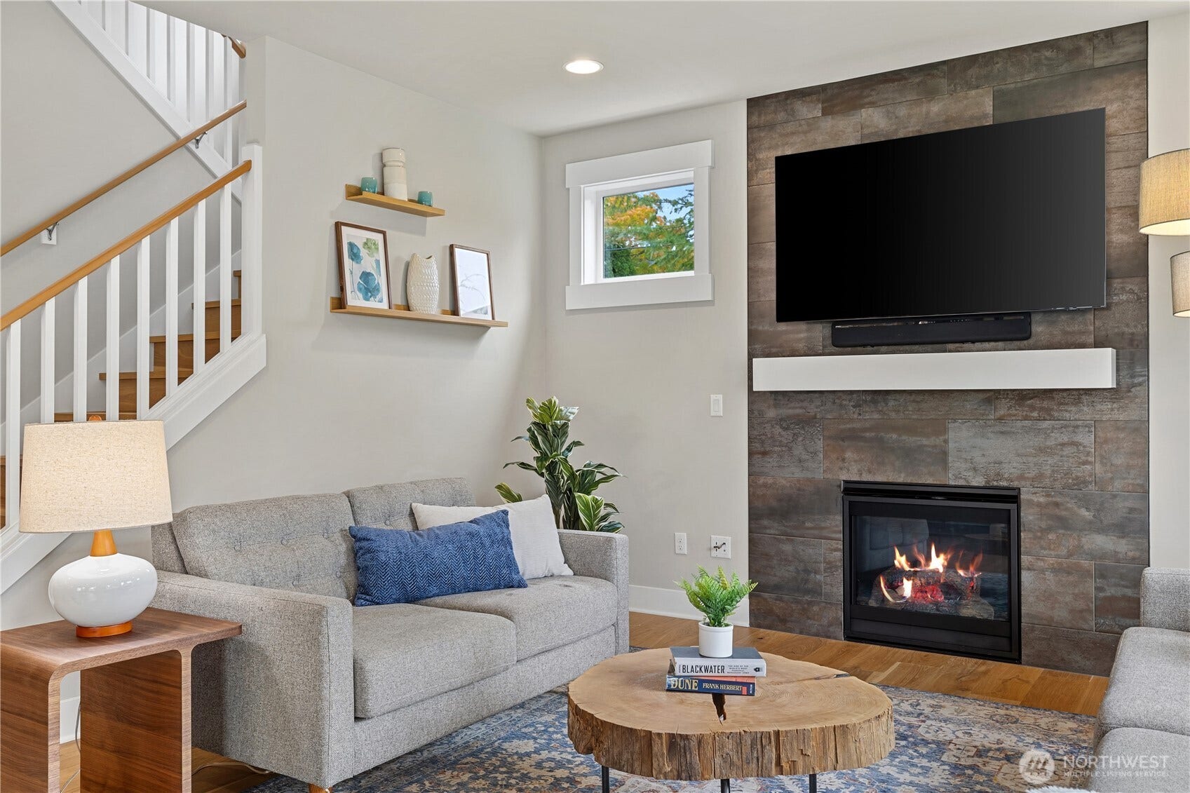 Living room features a gas fireplace.
