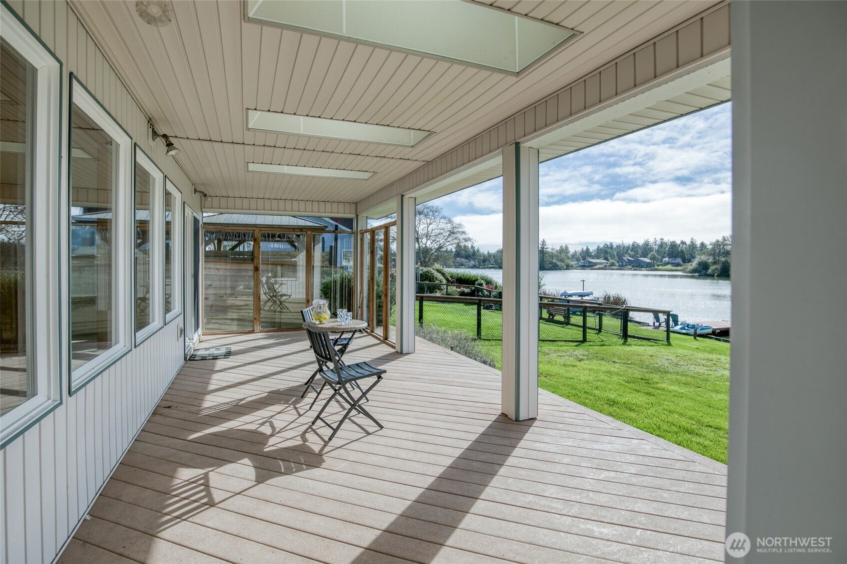 Covered back deck with wind blocks for all year enjoyment