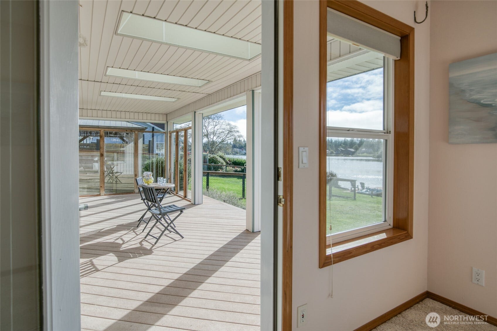 Step out your private entrance onto your covered back deck