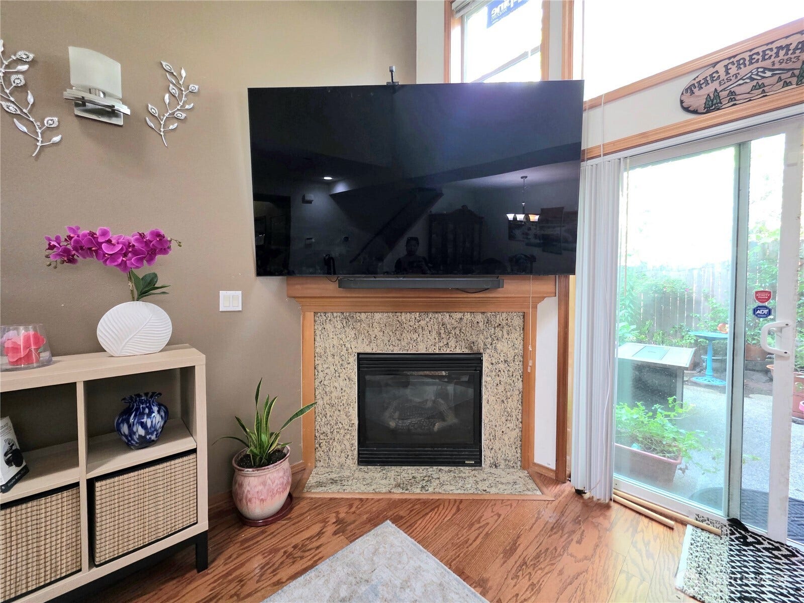 18866 108th Lane SE, Renton, WA 98055 Main floor - living room with a corner gas fireplace creates a natural focal point.