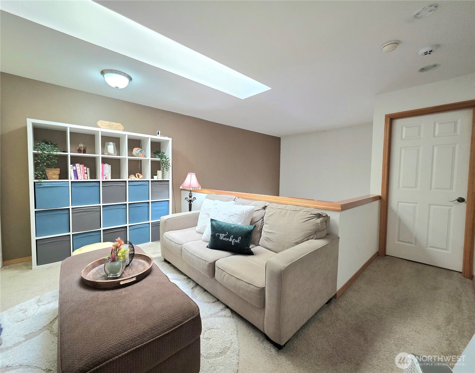 18866 108th Lane SE, Renton, WA 98055 2nd floor - family room/loft with skylight overhead. The primary bedroom is through the door to the right